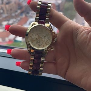 Gold and burgundy Michael Kors watch